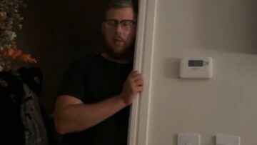 Hubby-Hits-Peak-Tiredness-Snoozes-Upright-at-the-Door.jpg