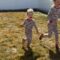 Little girl triumphantly falls from slide after winning race with sister | Adorable