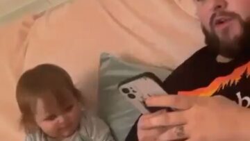 Princess-playfully-smacks-dad-with-toy-Super-Cute.jpg