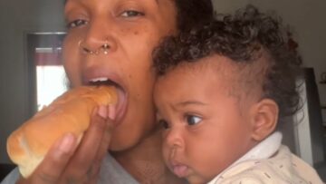 Hilarious-4-Month-Old-Baby-Tries-to-Eat-Moms-Hotdog-Sandwich.jpg