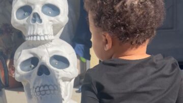 Toddlers-Joyful-Playtime-with-Halloween-Skulls-A-Heartwarming-Adventure.jpg